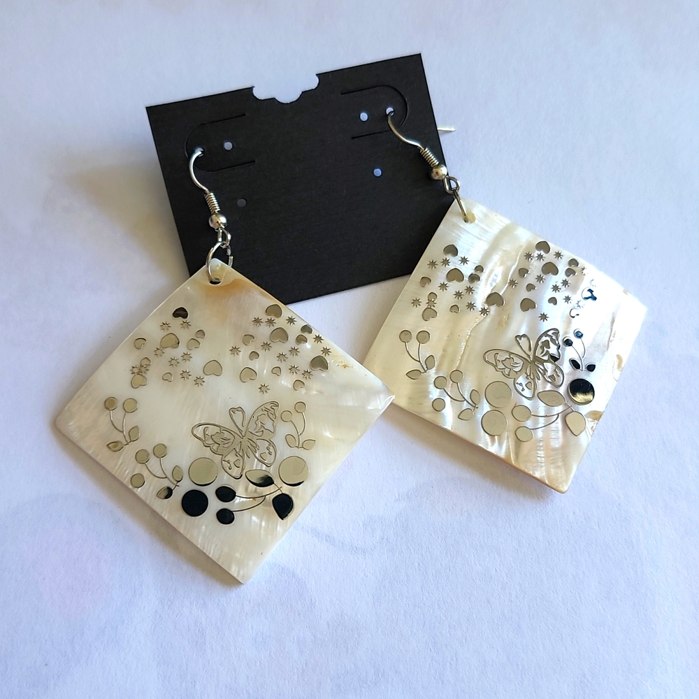 She'll earrings with designs